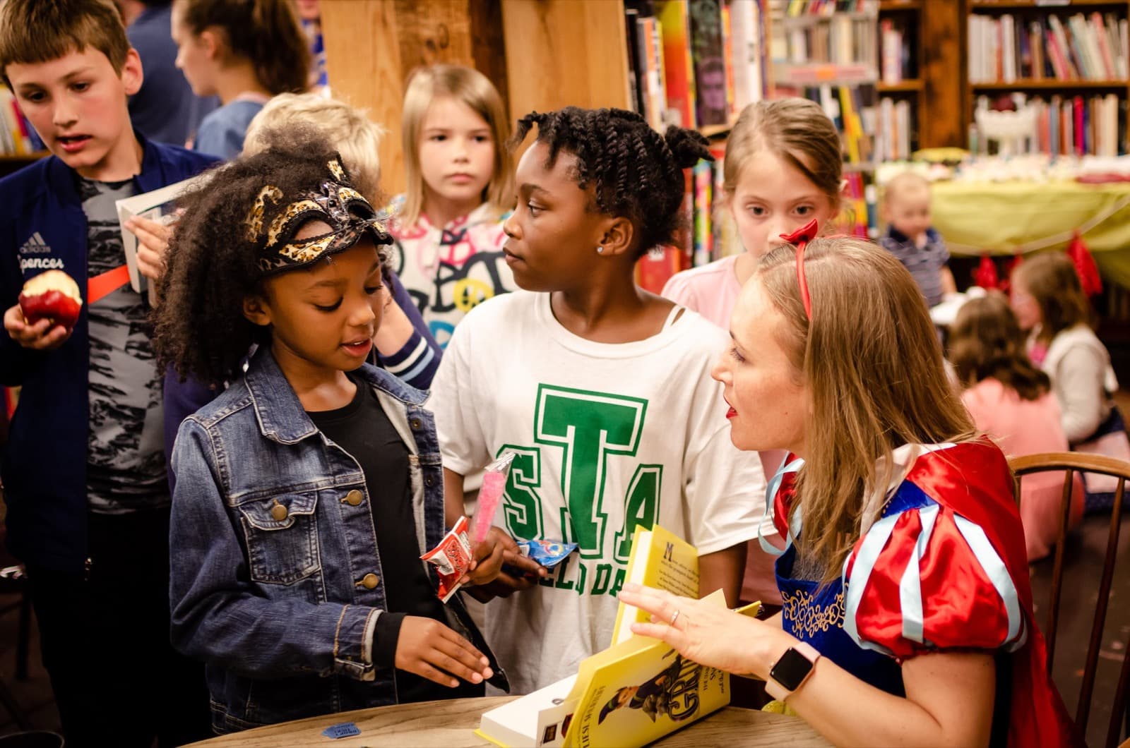 Liesl signing books for students at a GRUMP event
